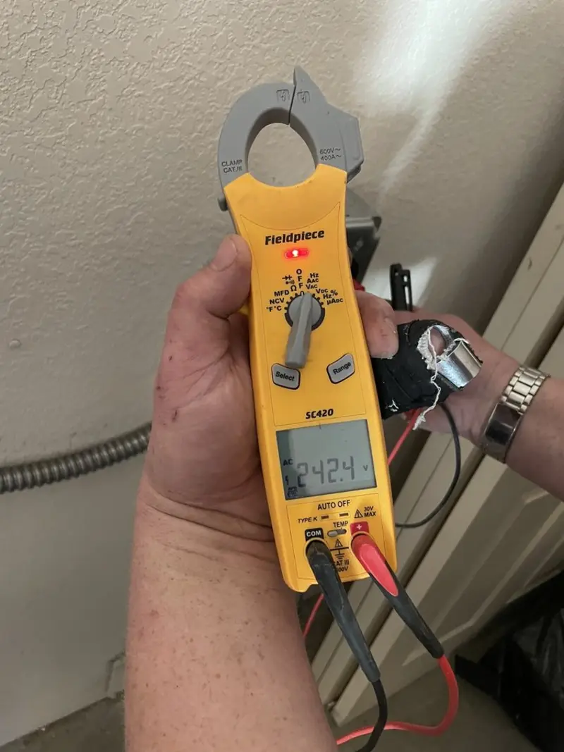 Voltage testing with clamp meter during Circuit Breaker Repair in Ticonderoga